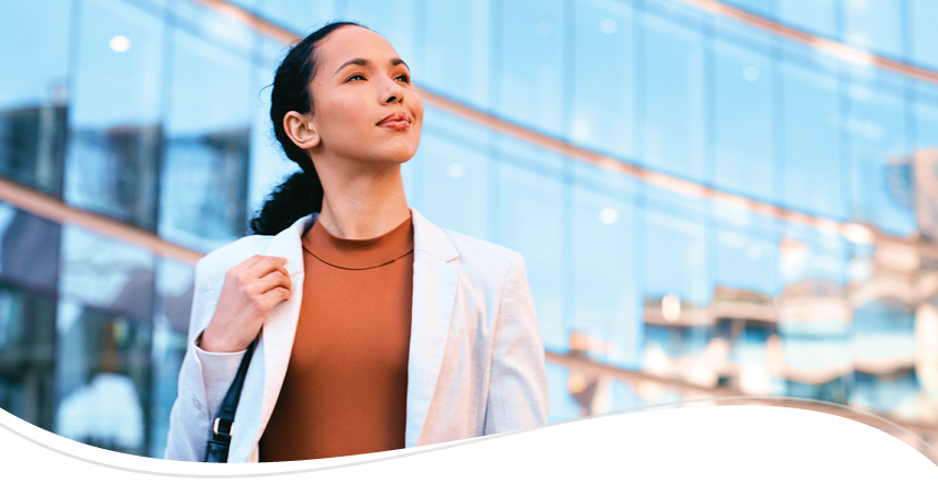 Corporate person looking up to the say proud