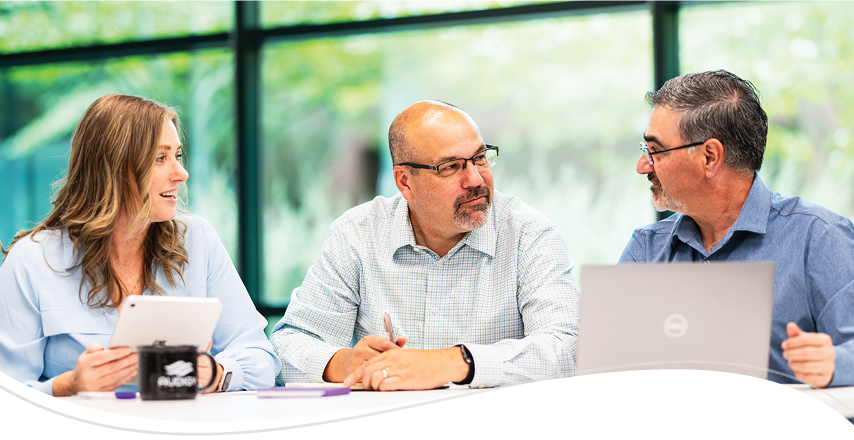 A group of professionals having a discussion at a table