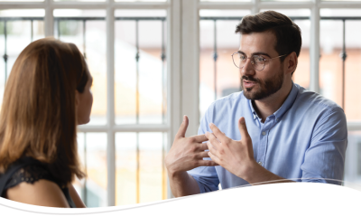 Two employees discussing something at length