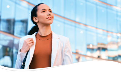 Corporate person looking up to the say proud