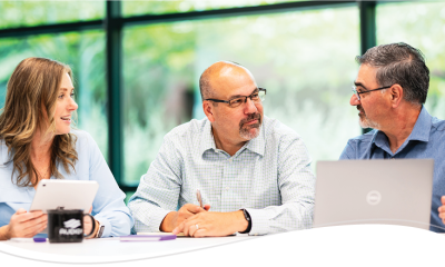 A group of professionals having a discussion at a table