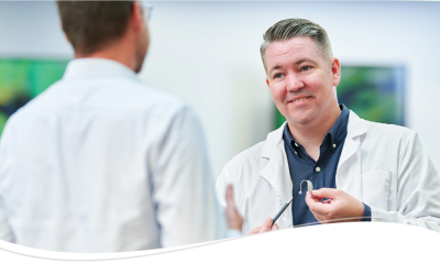 A provider speaks to his teammate
